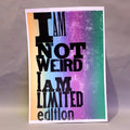 Colorful poster with text 'I AM NOT WEIRD I AM LIMITED edition' on a textured surface, printed on letterpress.