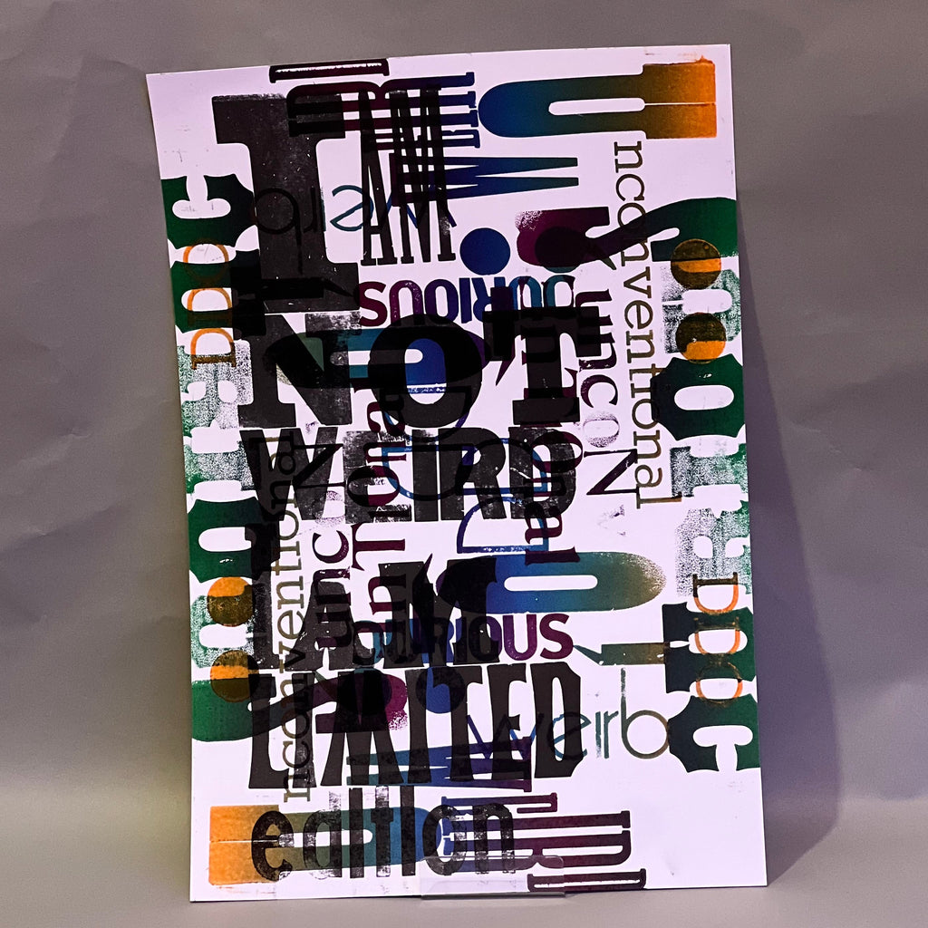 Colorful poster with text 'I AM NOT WEIRD I AM LIMITED edition' on a textured surface, printed on letterpress.