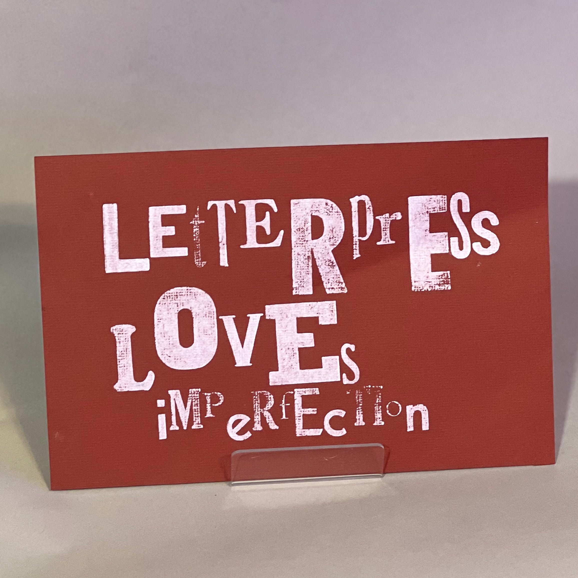 Letterpress Loves Imperfection on wine paper
